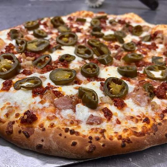 Pizza española grande "12 rebanadas.