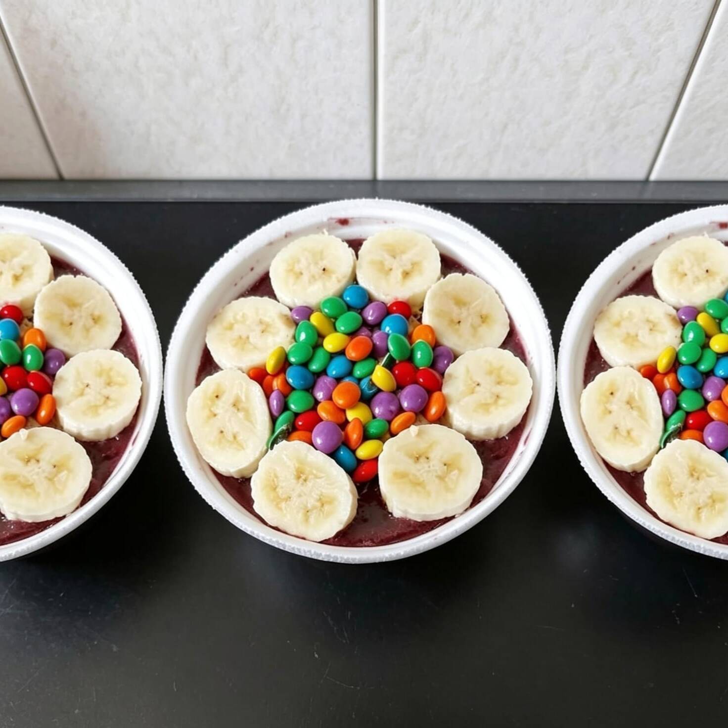 açai,granola,leite em po,banana,m&m,leite condensado,paçoca
