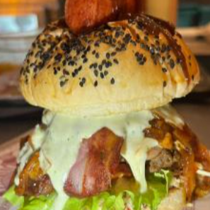 Combo Hamburguesa Deluxe + Papas + Gaseosa