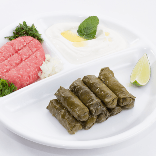 Charutos de uva acompanhado de quibe cru e coalhada seca.