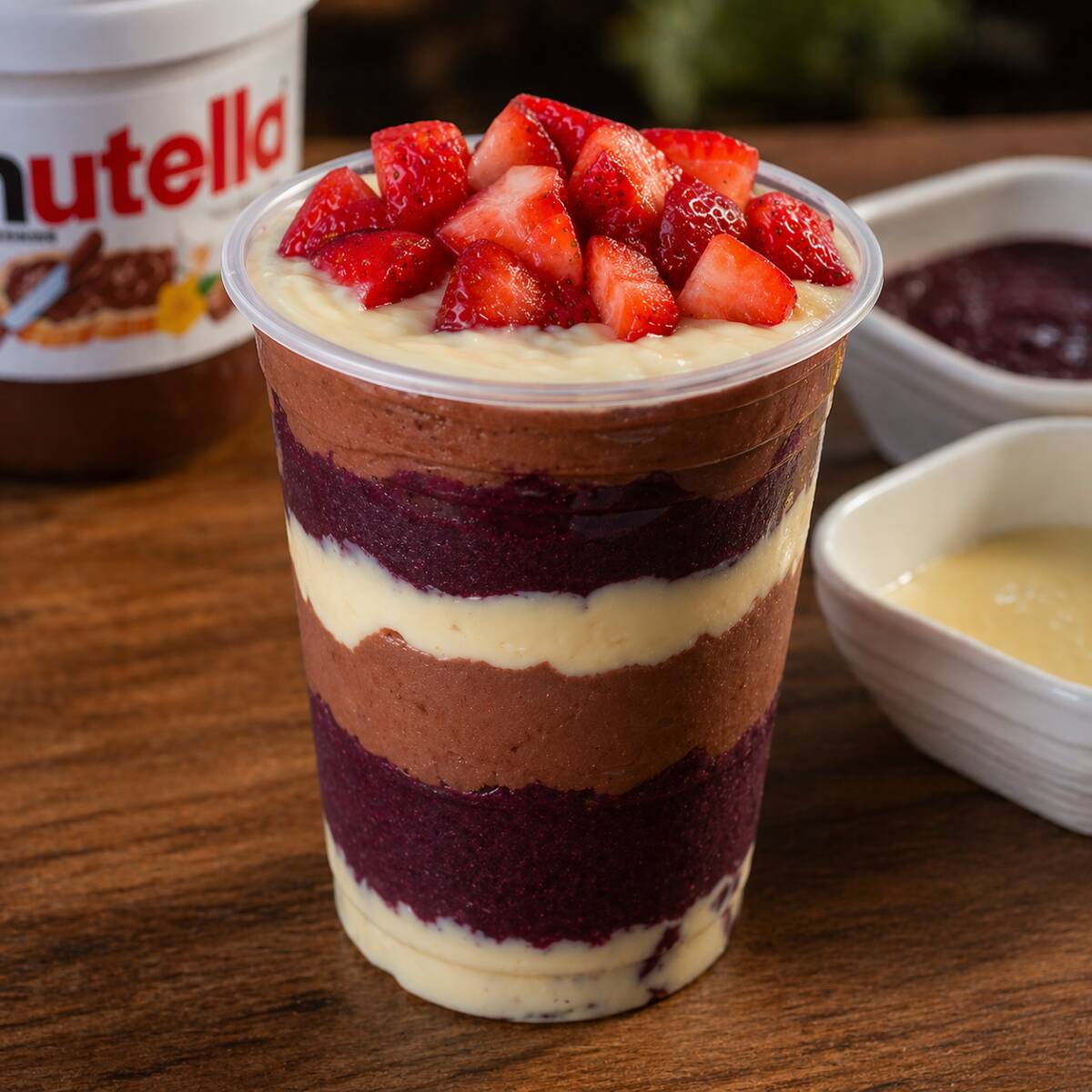1 Açaí Trufado 500ml Com Creme De Avelã E Creme De Leitinho, Recheado Com Camada De Leite Ninho, Leite Condensado E Morangos Frescos. Uma Explosão De Sabor!