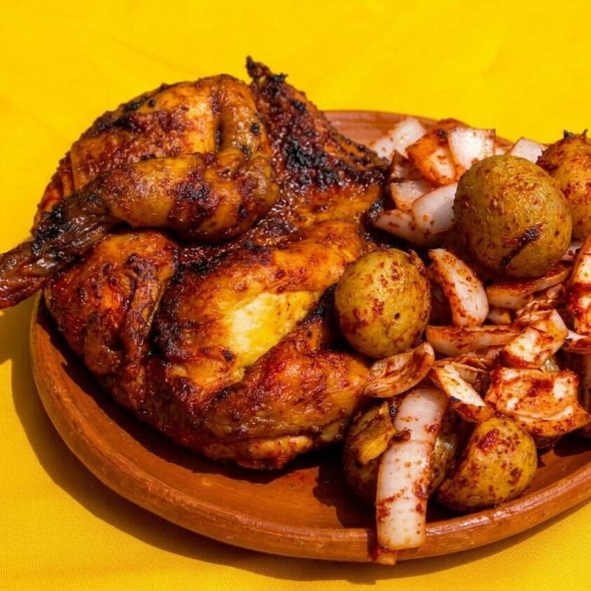 1/2 POLLO RANCHERO + GUARNICIONES