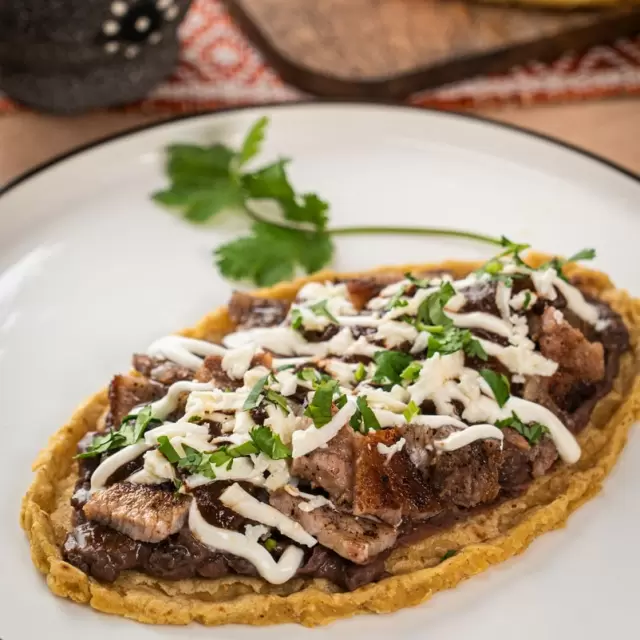 2 HUA.MILANESA CON QUESO +2 AGUAS HORCHTA GRATIS