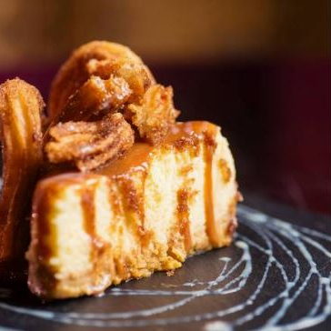 Cheesecake con Churros y Cajeta con Tequila