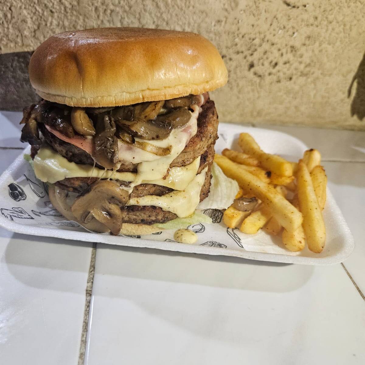 Champiñones triple carne y queso