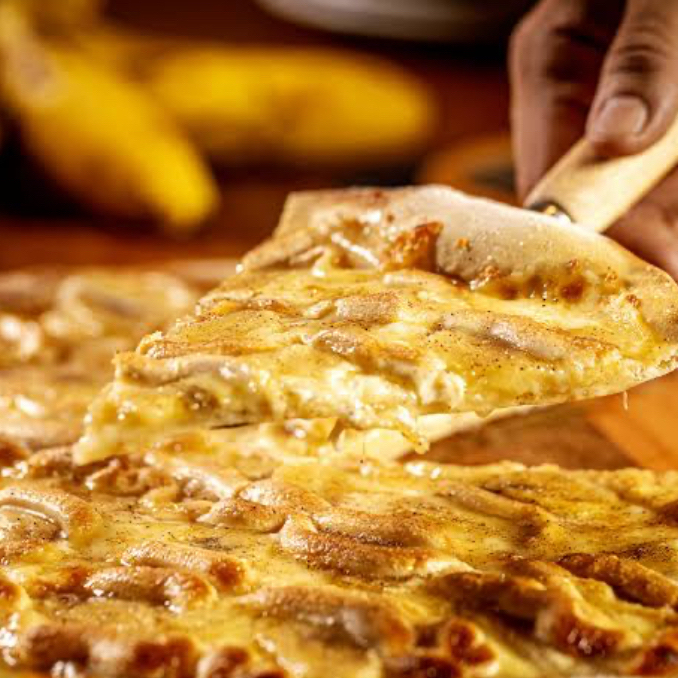 1 pizza grande meia a meia (mussarela meia calabresa) 8 pedaços + 1 broto doce (brigadeiro prestigio ou mms escolhe na observação)+ 1 refrigerante tiss 2 litros