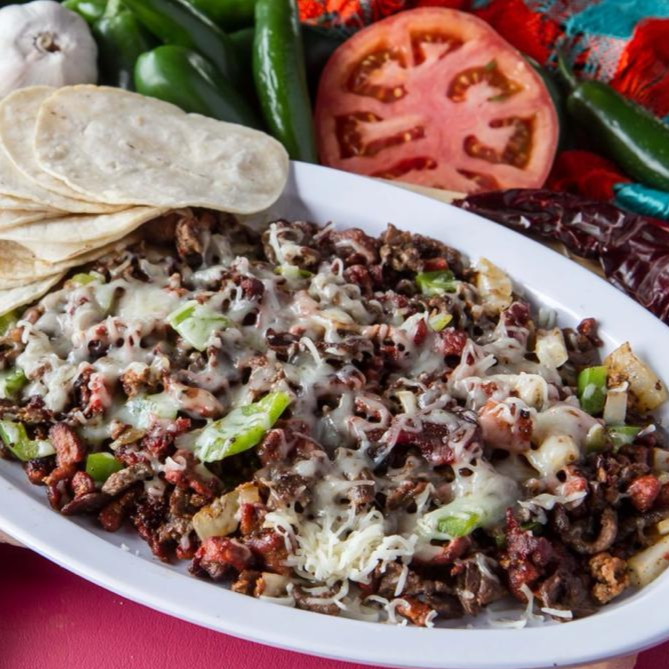 Mitla - Bistec, tocino, chuleta, pastor y queso