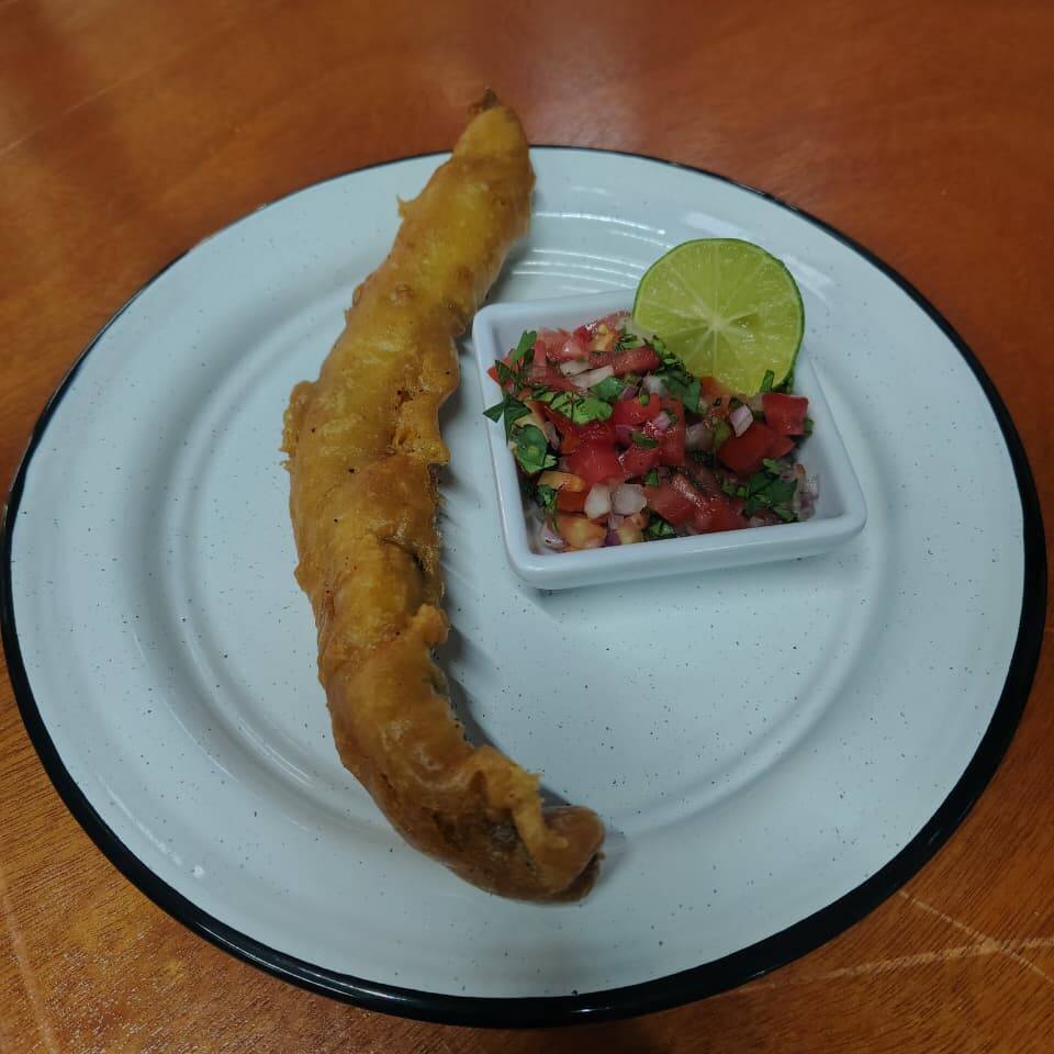 <Filetito de pescado capeado
