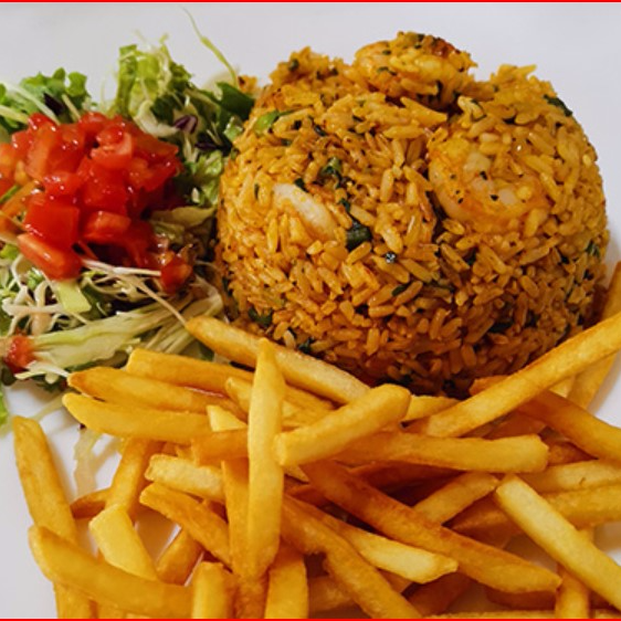 Arroz Con Pollo Y Camarones,Papas Y Ensalada