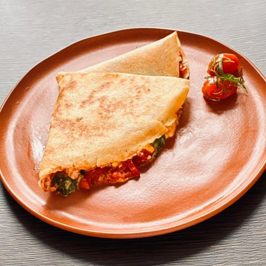 Creme de queijo, tomate confit e rúcula