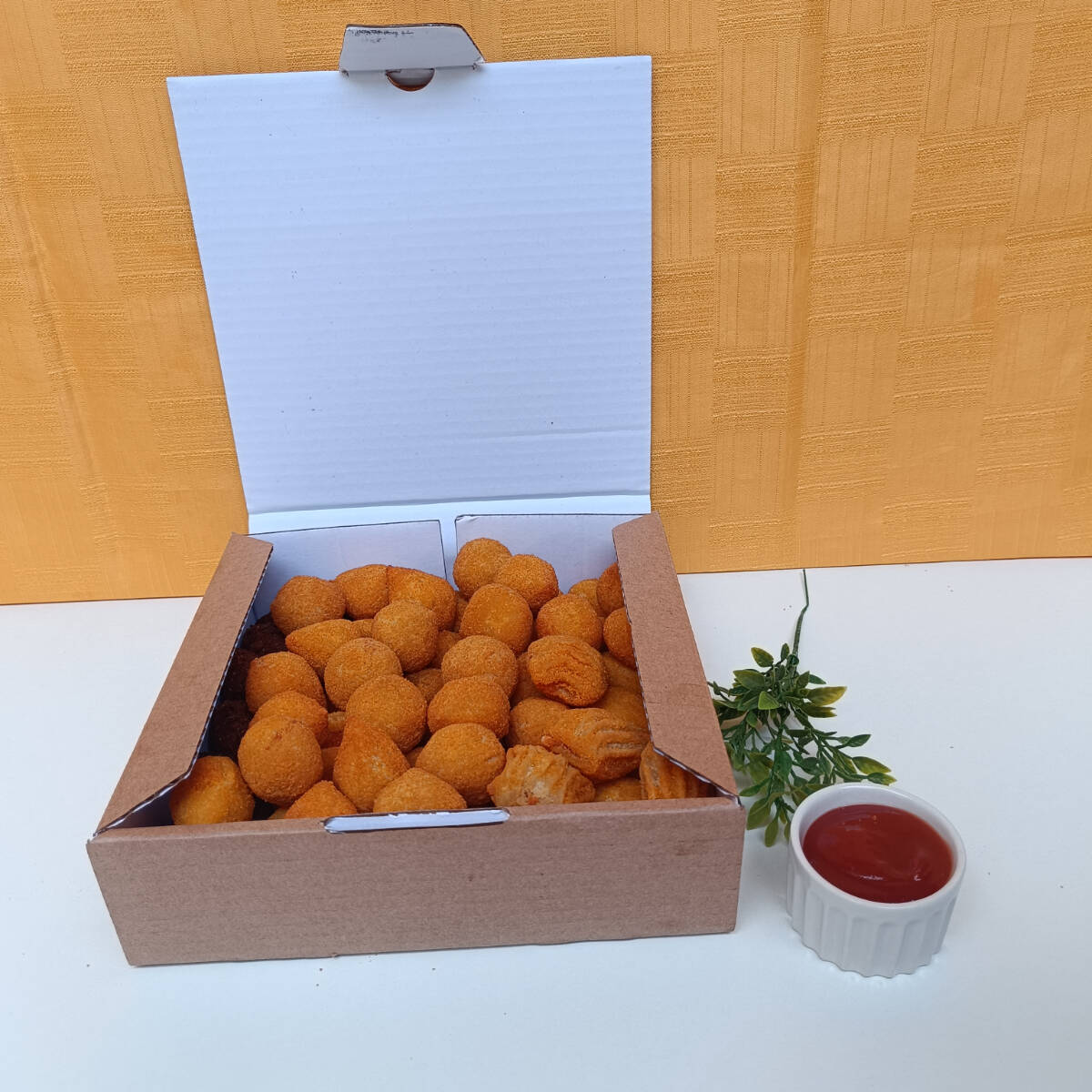 100 unidades dos deliciosos salgados Ritoni.