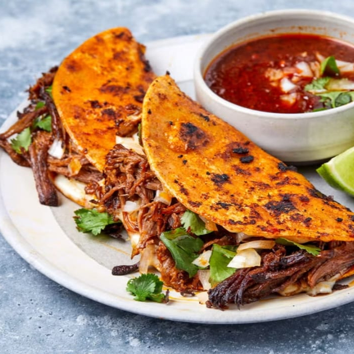 2 Tacos Suaves + 1 Concome.