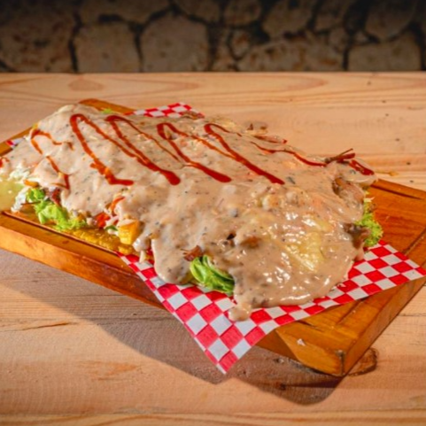 Patacon en salsa de Chanpiñones
