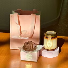 Kit com sacola + pudim no pote + maço bombom de Prestígio