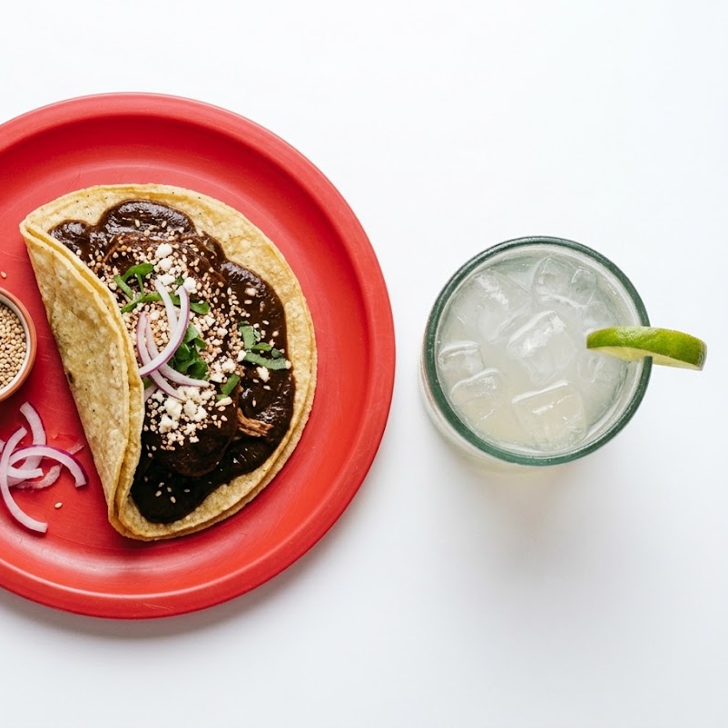1 Taco y una Bebida de la Casa de 500 ml