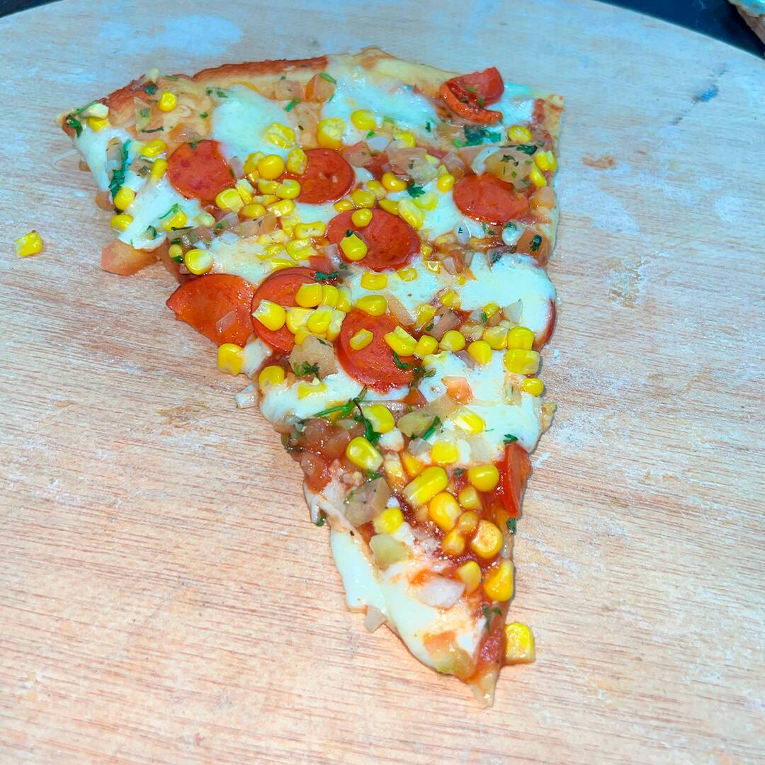 Porción de Pizza Paisa + Gaseosa 250ml