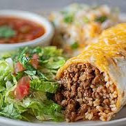 TORTILHA DE TRIGO GIGANTE (30 CM) RECHEADA COM CARNE DESFIADA SUCULENTA (MACHACA), MOLHO CHILLI BEANS COM FEIJÃO VERMELHO E PIMENTÕES, CREMOSO GUACAMOLE, SOUR CREAM ARTESANAL E QUEIJO CHEDDAR DERRETIDO.