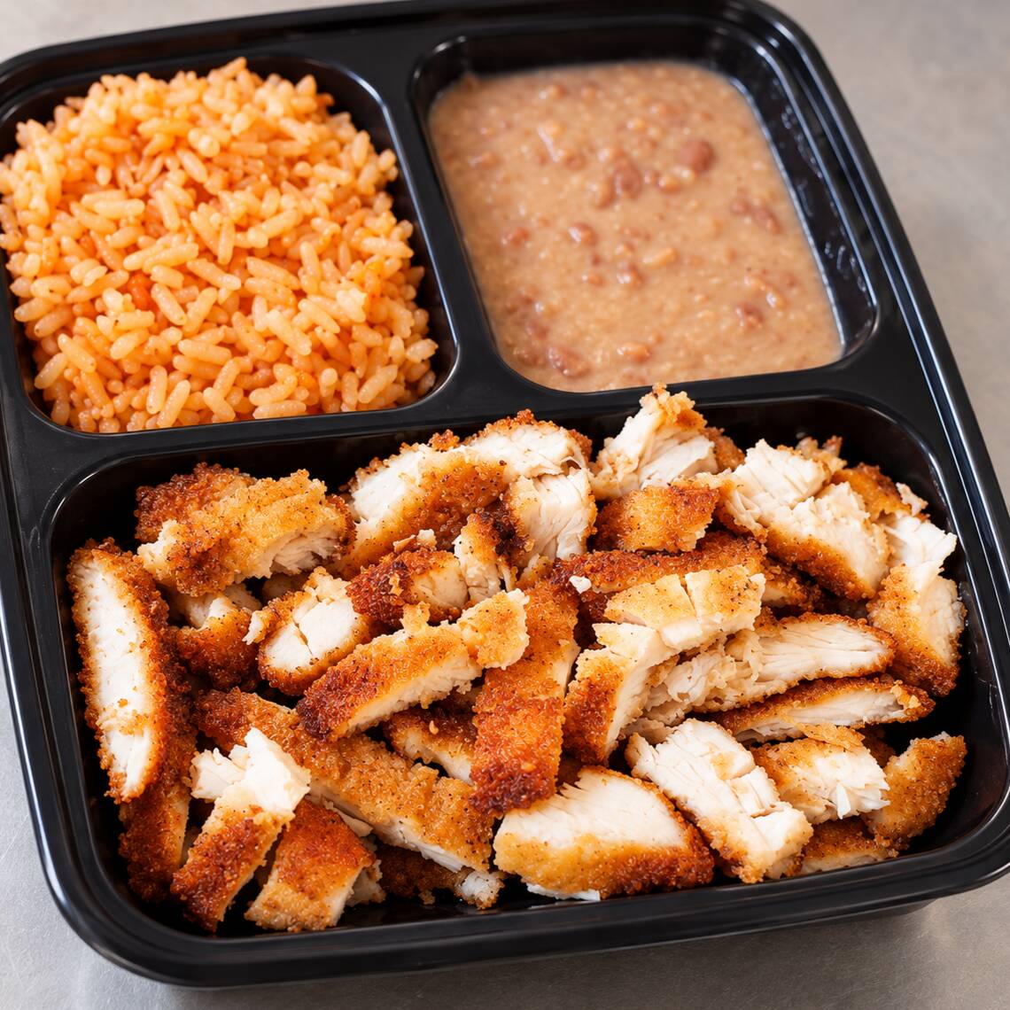 Platillo Milanesa de Pollo Empanizada Arroz