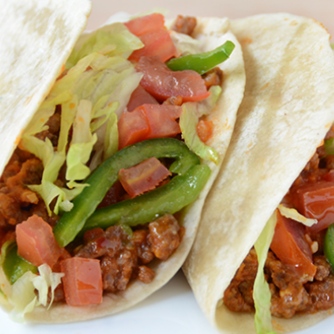 2 Tacos de Carne mas Bebida 250 Ml