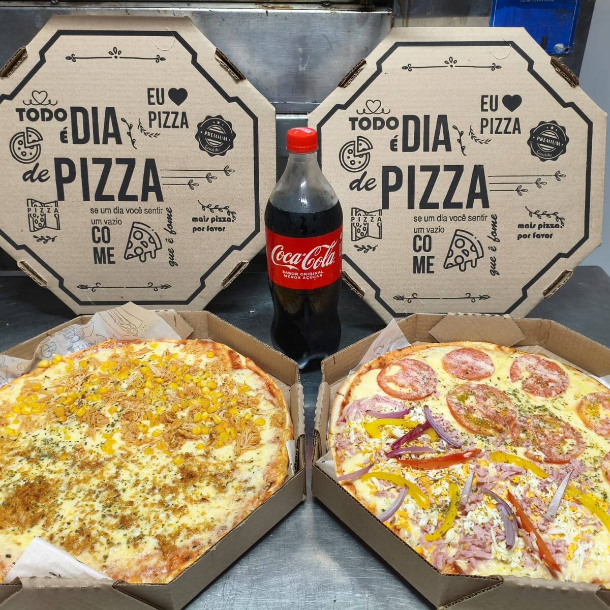 2 pizzas tamanho G, nos sabores calabresa e portuguesa, acompanhadas de 1 guarana antartica 1L.