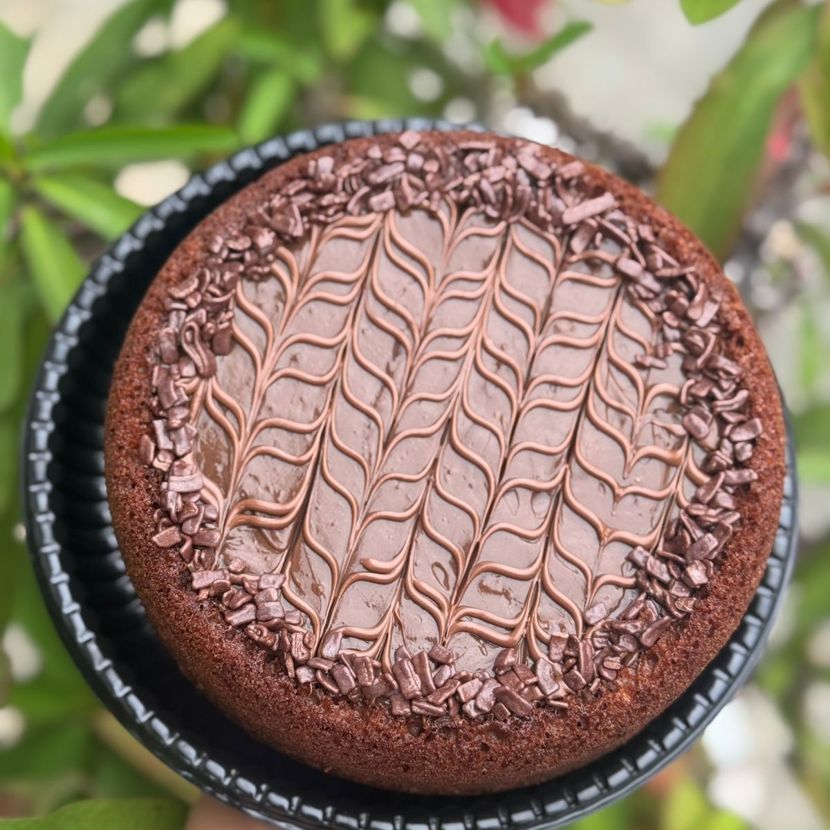 Massa de chocolate com recheio de brigadeiro com Nutella. 18cm