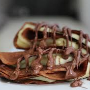 Crepioca deliciosa de Nutella com kitkat branco.