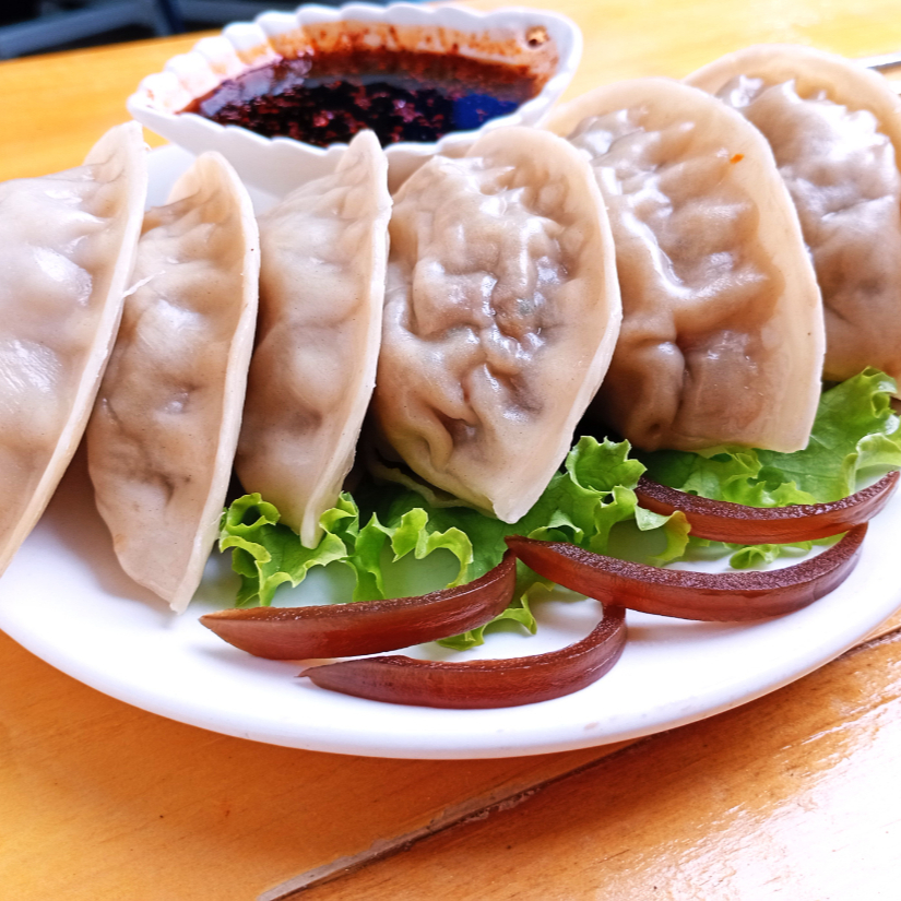 Mandu y Cebolla Marinada
