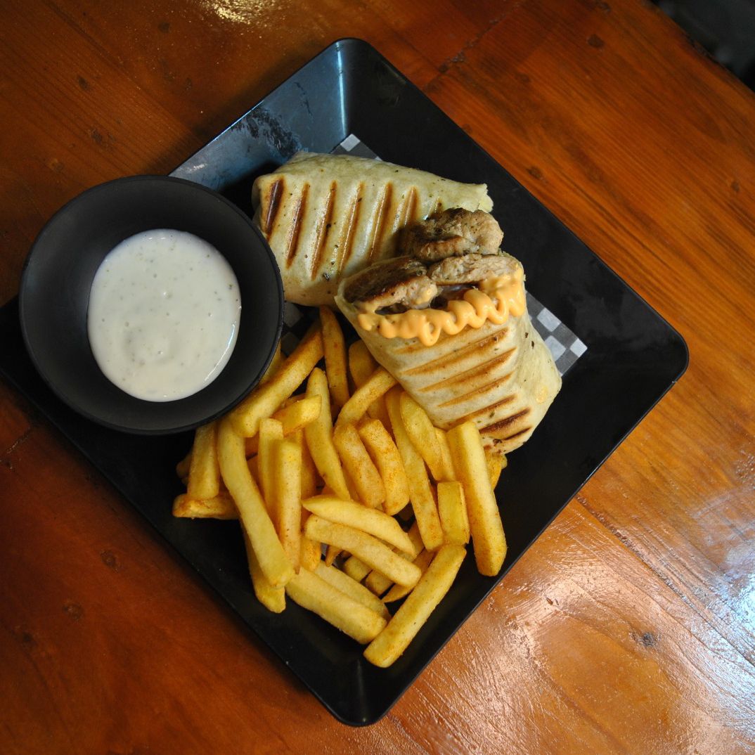 Wrap de cerdo + porción de papas
