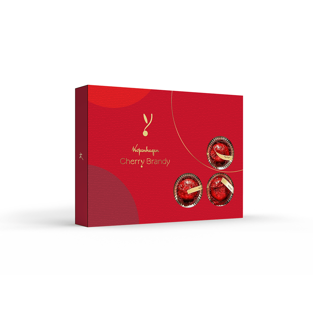 Com o Cherry Brandy 348g, você conhece toda a qualidade que os chocolates Kopenhagen tem a oferecer. O Bombom é recheado com cereja macerada em calda de açúcar, vinho, canela e licor Cherry Brandy, além de ser coberto por duas camadas de fondant com licor, conhaque e chocolate ao leite. Experimente e se apaixone! Produto Alcoólico. Não recomendado para menores de 18 anos