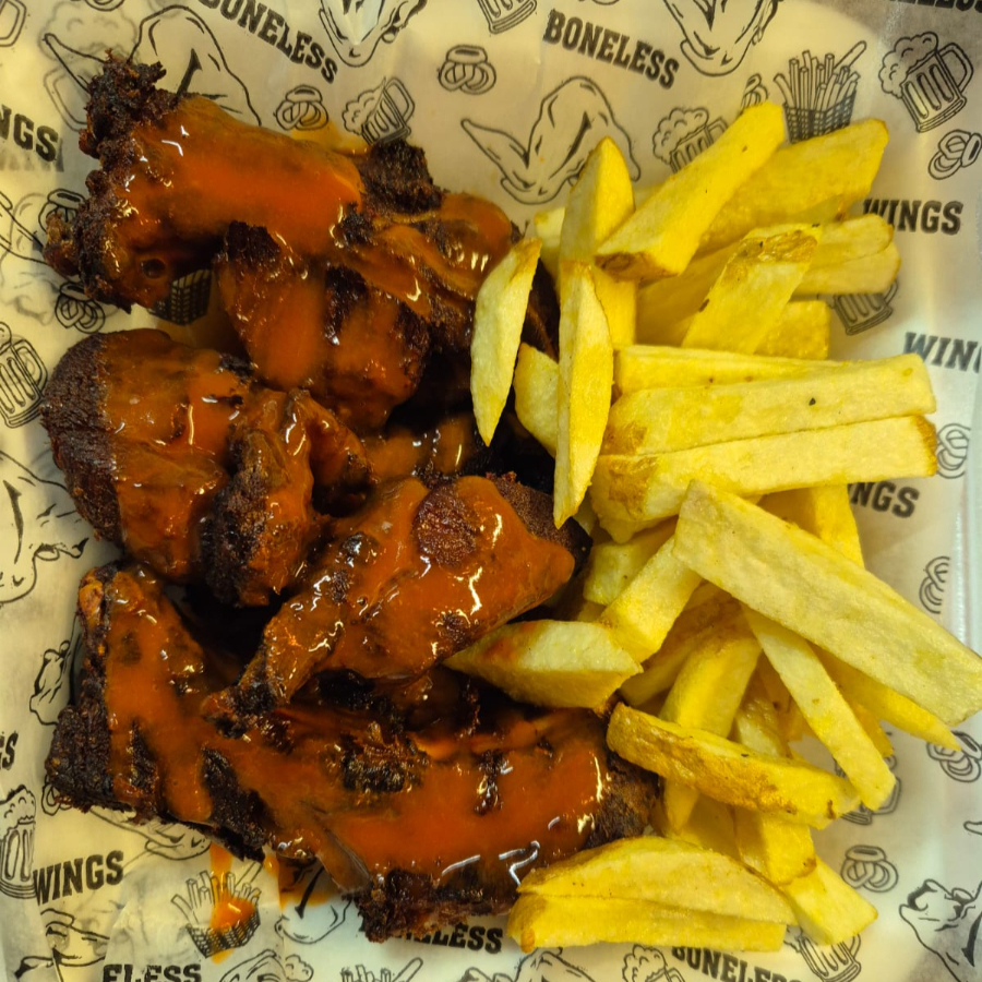 Costillas con papas a la francesa