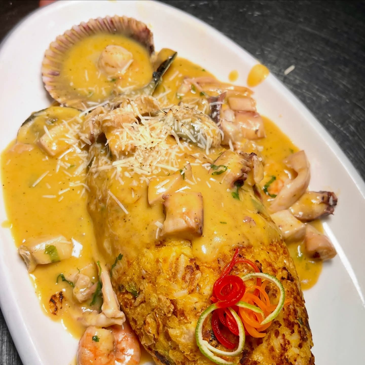 Tacu Tacu en Salsa de Mariscos