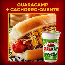 "1 Linguiça, molho '' cebola e tomate "" bacon, calabresa, presunto, muçarela, ervilha, milho, uva passas, azeitona, ovo de codorna, batata palha, queijo ralado, ketchup, maionese, mostarda e maionese temperada da casa."