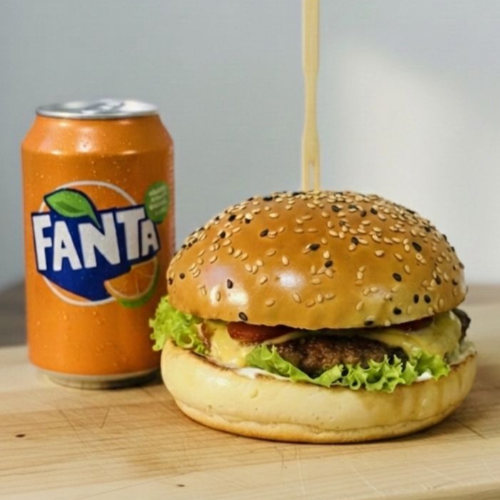 Prime Burguer, pão de gergile, blend de 130g, molho da casa, alface, picles, molho barbue