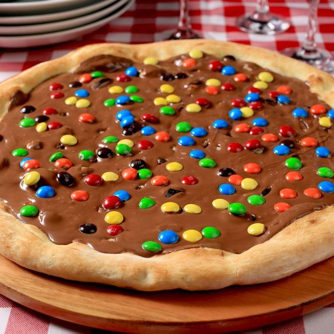 Creme de leite, chocolate negro especial e com cobertura de Confete!