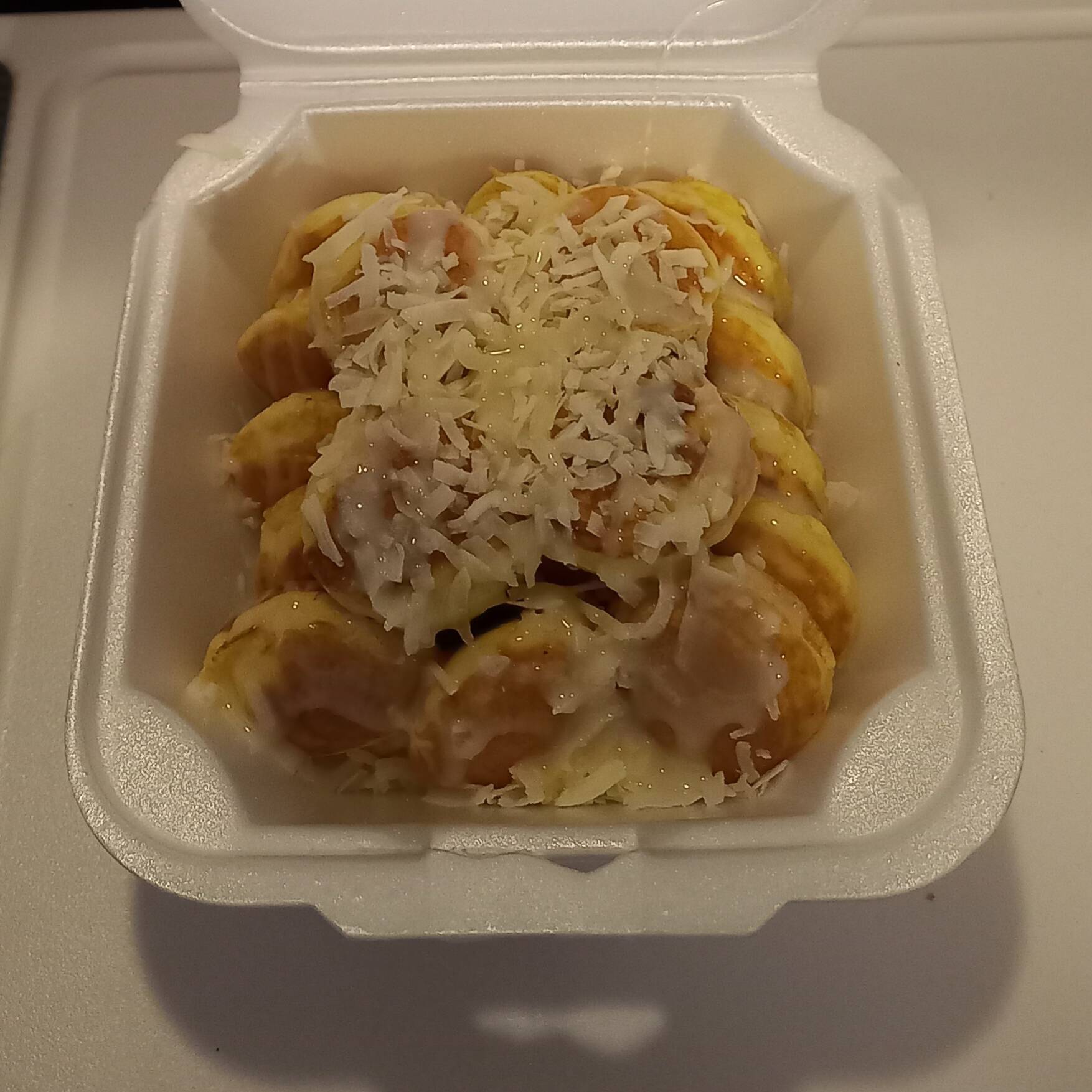 40 Mini hotcakes con lechera y ralladura de coco