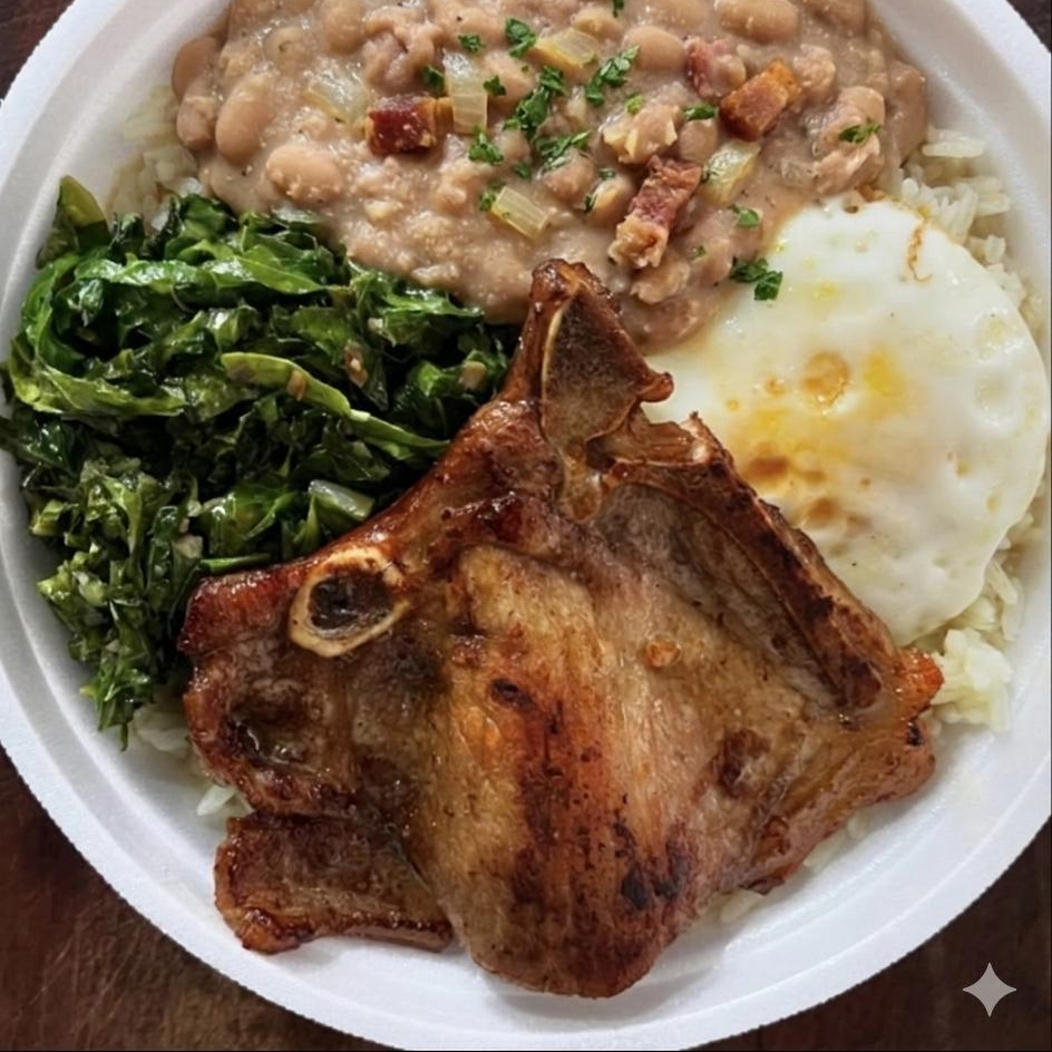 Acompanha arroz branco tutu de feijão ovo frito bisteca de porco e couve refogada no alho !