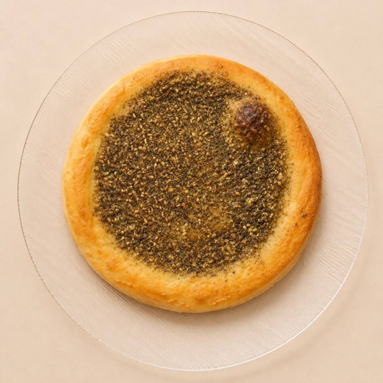 O sabor clássico do Oriente em uma esfiha de 15cm preparada com a tradicional mistura de zaatar e azeite de oliva, assada sobre massa artesanal leve e macia.
-----tags-----
esfiha, muhammara, comida árabe, culinária síria, artesanal, gourmet, delivery, almoço, jantar, lanche, assado, forno, especialidade da casa, ingredientes frescos, sabor oriental