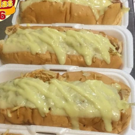 2 perros gratinados + 2 papas + 2 gaseosas