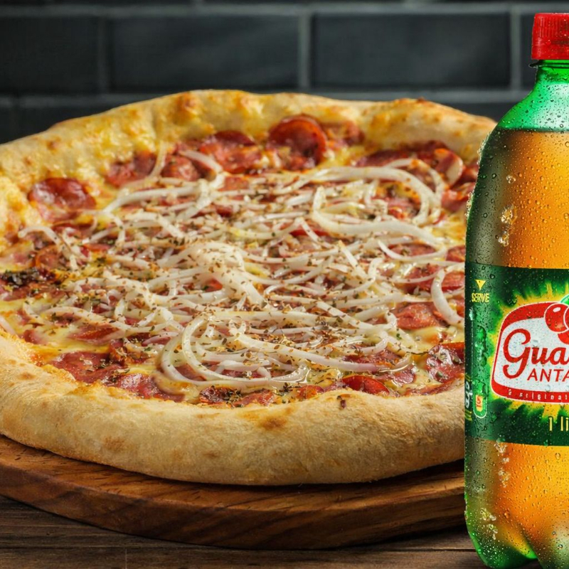 *Pizza Calabresa* Molho italiano, mussarela, calabresa, cebola e orégano. Clássico que conquista o paladar de todos + Guaraná Antarctica 1l Grátis