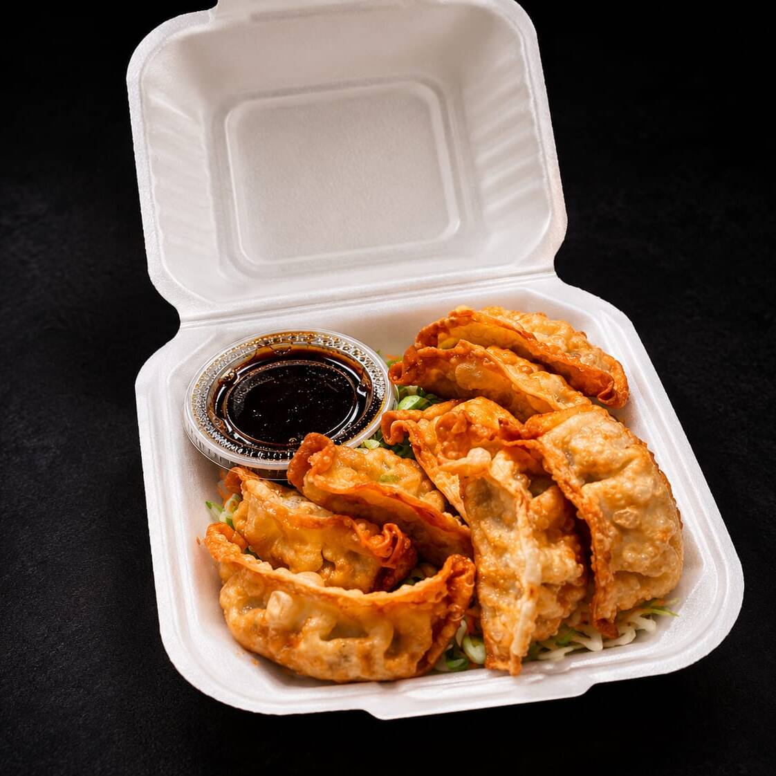 5 Gyozas a Elegir mas 1 Oz de Salsa