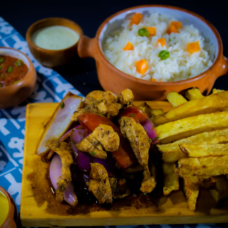 Pollo Saltado de la Reina al Wok