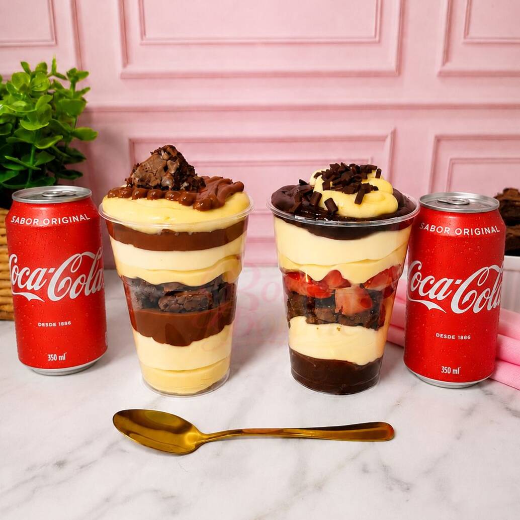 Leve 2 Copos da Felicidade, no seu sabor preferido, com desconto. Brownie e recheio no ponto, do jeito que a gente gosta. Você não vai se arrepender!!!!! Cada Copo da Felicidade pesa aprox: 250g
Acompanha 2 Coca-Cola 350ml.
Serve até 2 pessoas.