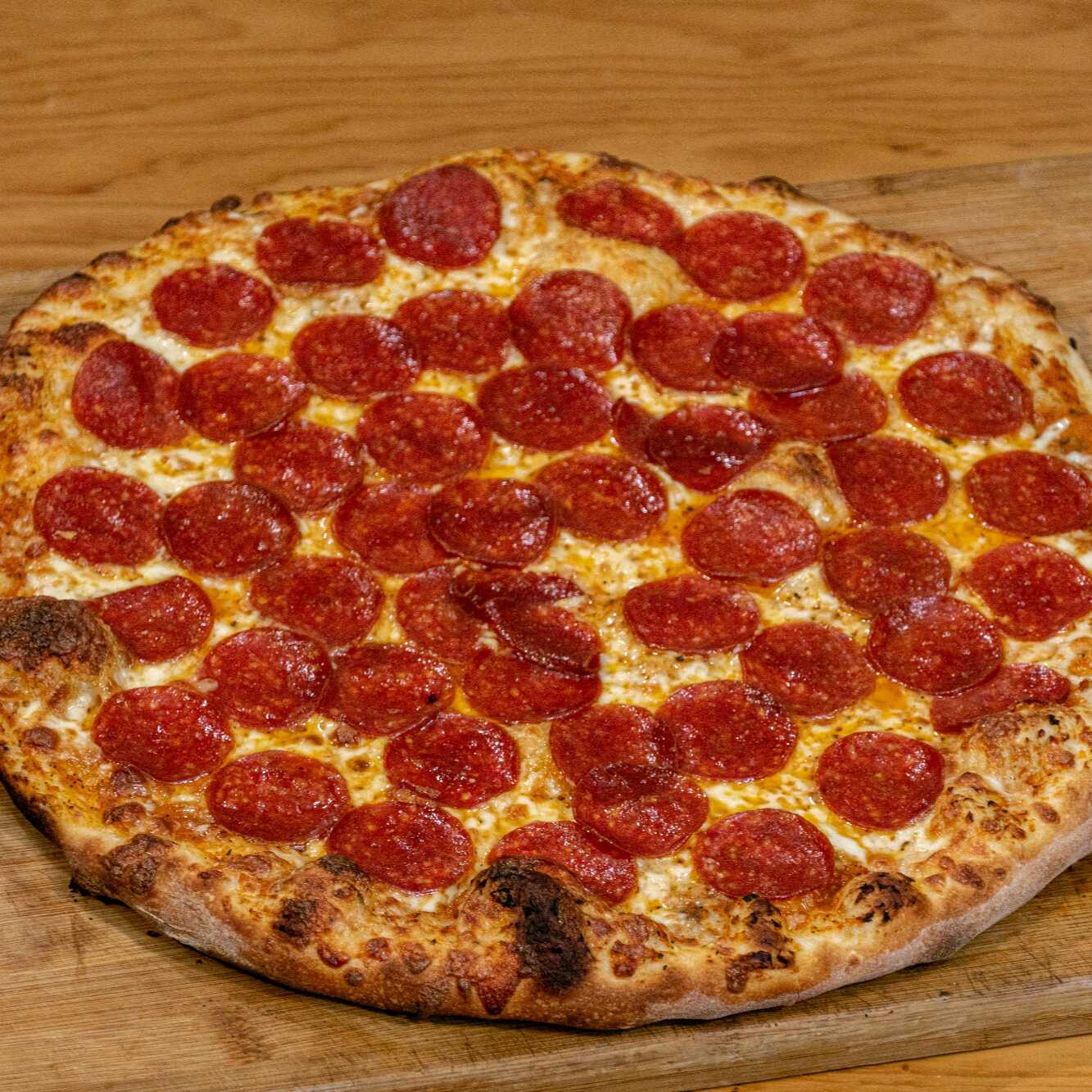 Pizza Familiar 1 o 2 Ingredientes