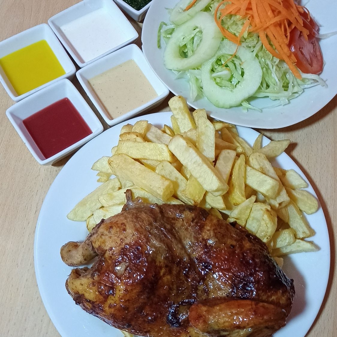 1/2 Pollo a la Brasa Más Bebida Pepsi