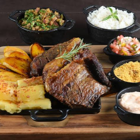 uma porçao 500 gramas
pao de alho
arroz
farofa
carne do chefe