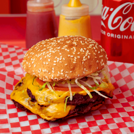 Doble C/Queso + Papas Clásicas + Refresco o Agua