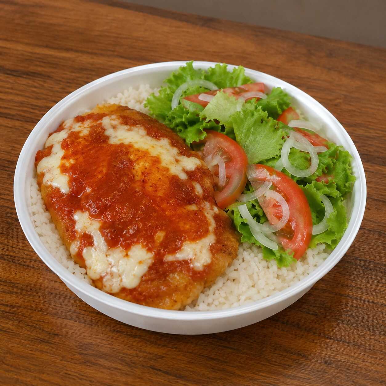 Parmegiana de frango com arroz, feijão e salada (Aprox. 450g).