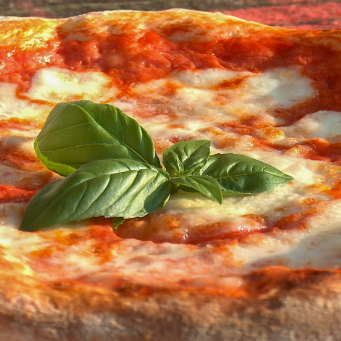 Promo Pizza Primavera 8 tajadas y pan al ajo