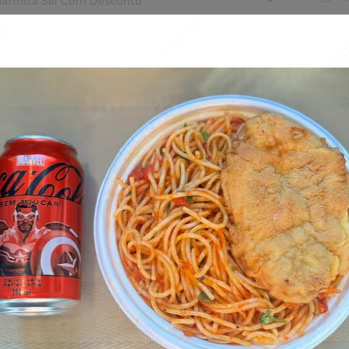 Marmita com delicioso filé de frango empanado na massa crocante acompanhado de macarrão espaguete ao molho de tomates Acompanha refrigerante Coca Cola lata Zero sem açúcar 350ml bem gelada. Marmita indicada para 01 pessoa.