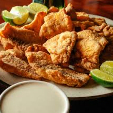 LOBO DE TIÁPIA EM PALITOS EMPANADO NA FARINHA PANCO FRITO PORÇAO DE 500G